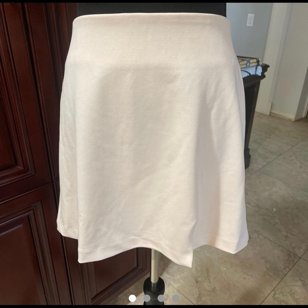 Forever 21 size 9 BLUSH skirt! Silk lining inside! Mini!  Brand New!